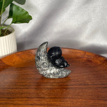 Load image into Gallery viewer, Black Obsidian Astronaut on Yooperlite Moon
