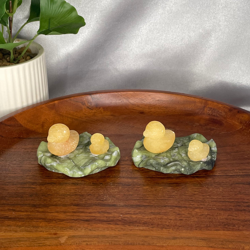 Calcite Ducks on Serpentine Lilypad